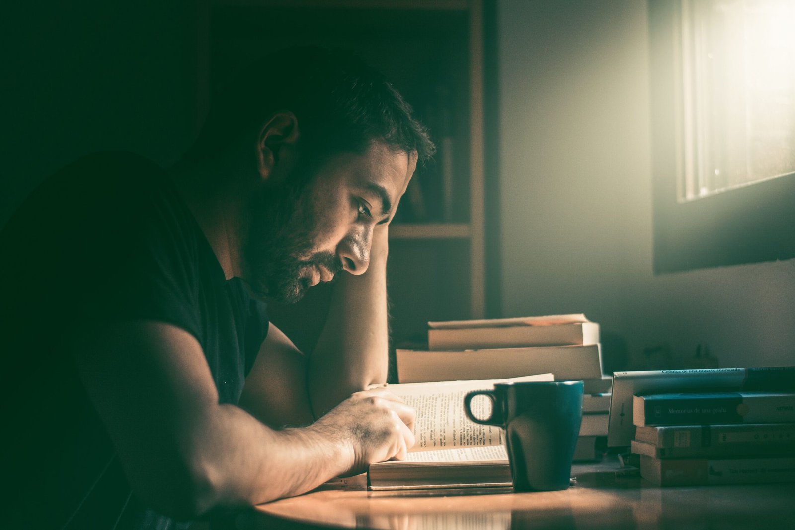 Student reading and checking documents carefully on a desk