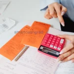 Subsidized vs Unsubsidized Student Loans: How 2026 Law Changes Affect Your Choice A detailed look at a student financial aid offer letter on a wooden desk next to a pen and calculator.