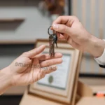 How to Report Rent to Build Credit for Students: The Ultimate 2026 Financial Shortcut A college student reviewing an off-campus lease agreement next to apartment keys, planning to report their rent to build a credit score.